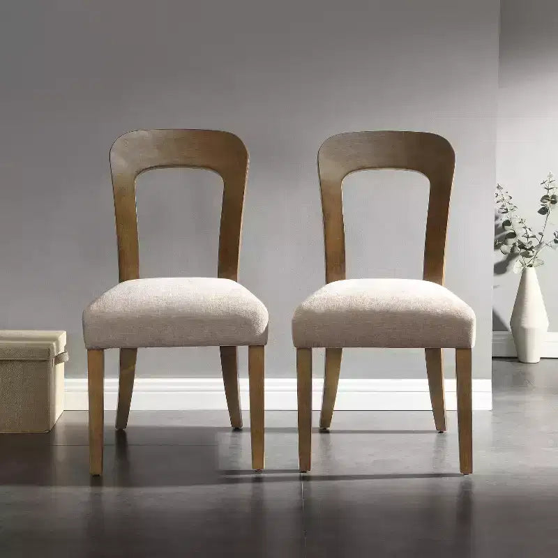 Elegant wooden dining chairs with chenille upholstered seats and solid rubberwood frames