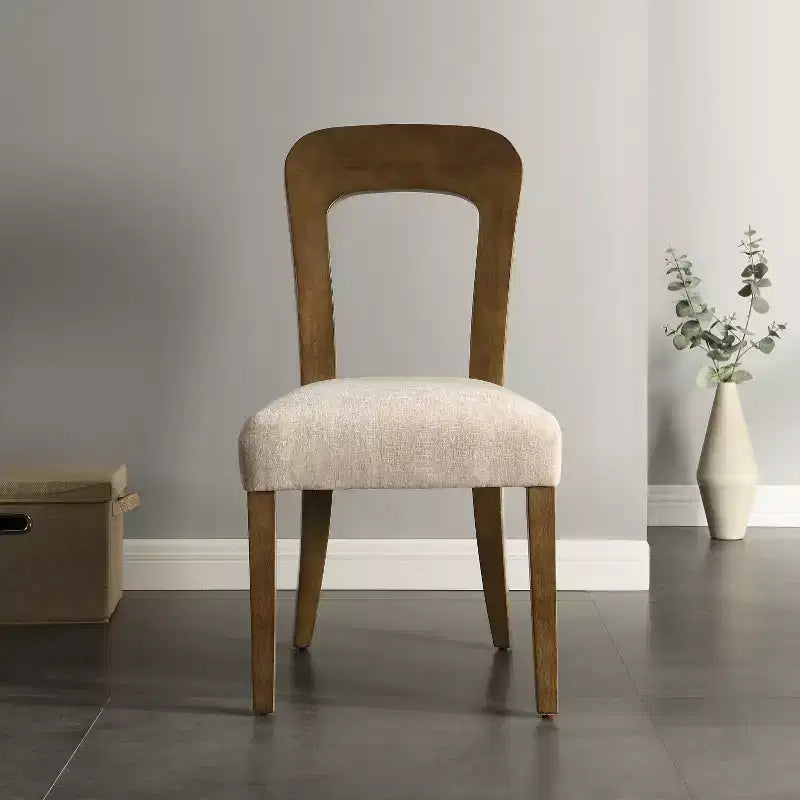 Elegant wooden dining chairs with chenille upholstered seats and solid rubberwood frames